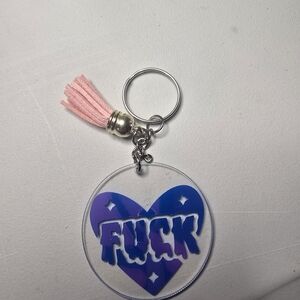 Heart-Shaped Keychain with Pink Tassel